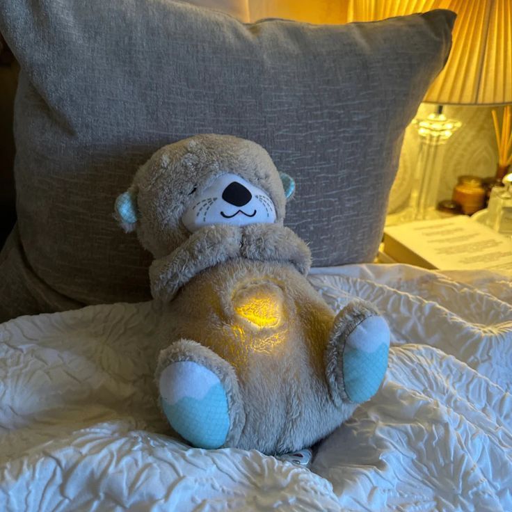 Soothe 'n Snuggle Otter Portable Plush Sound Machine with Music Lights!.jpeg__PID:8988ccaa-dc21-47ee-a7c4-5843aa87b399